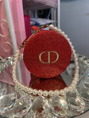 Dior Round Red Case with Pearl Wristlet Attached